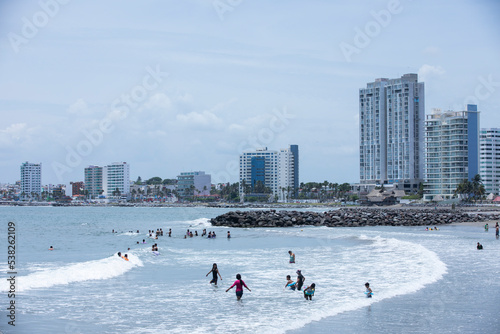 Daytime view of a warm summer day at a skyline framed beach at Boca del Rio, Veracruz, Mexico. photo