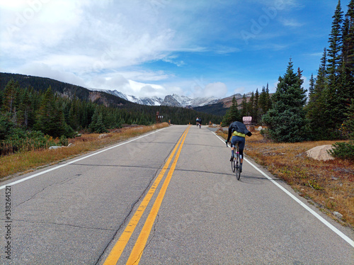 Riding a bike in the mountains. Brainard Lake, Boulder, Colorado photo