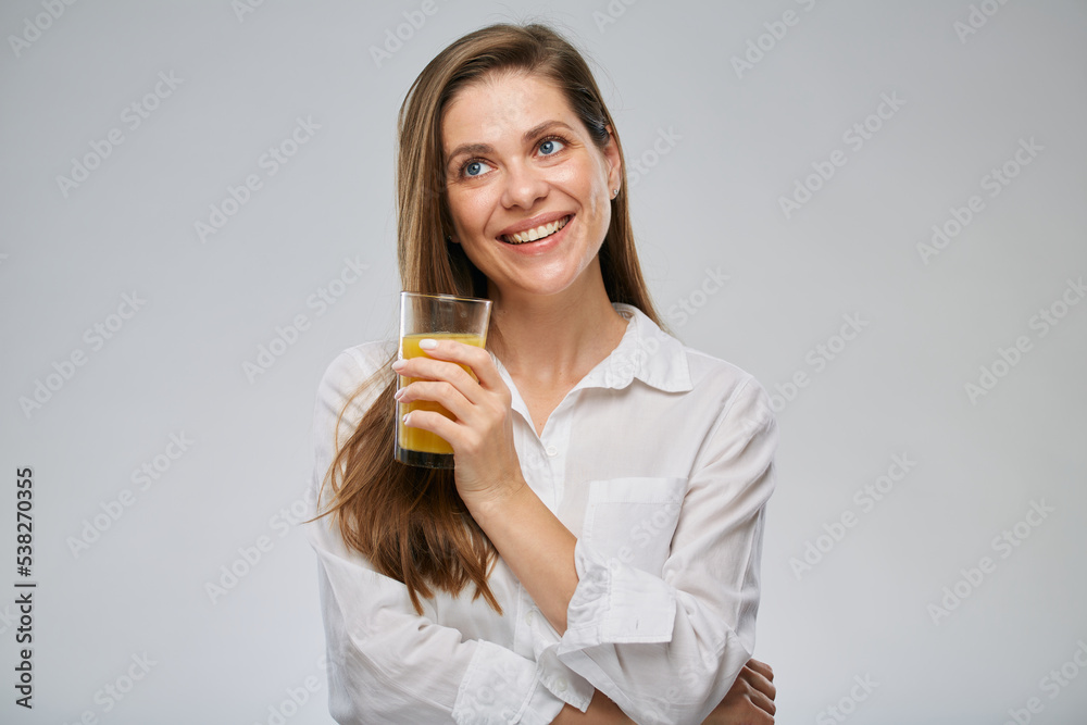 Smiling woman drinking orange juice. Isolated female advertising portrait. Smiling woman drinking orange juice. Isolated female advertising portrait.
