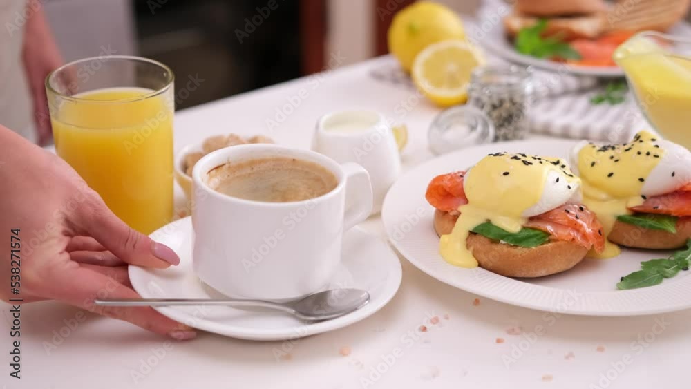 tasty benedict egg breakfast - Salmon fillet sandwich with cream cheese and poached egg at domestic kitchen tasty benedict egg breakfast - Salmon fillet sandwich with cream cheese and poached egg at domestic kitchen