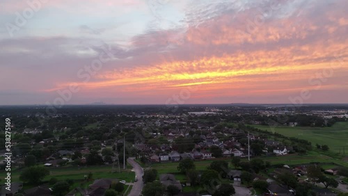Aerial View of a Sunset over Houston with the city in the background	