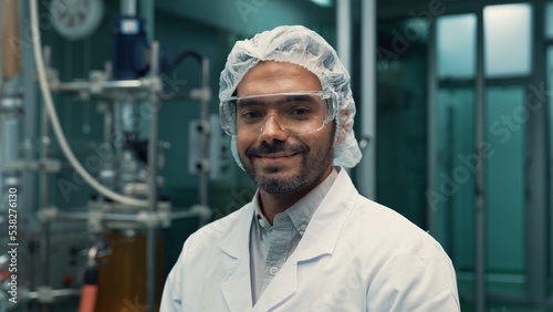 Fotografie Portrait of a man scientist in uniform working in curative laboratory for chemic