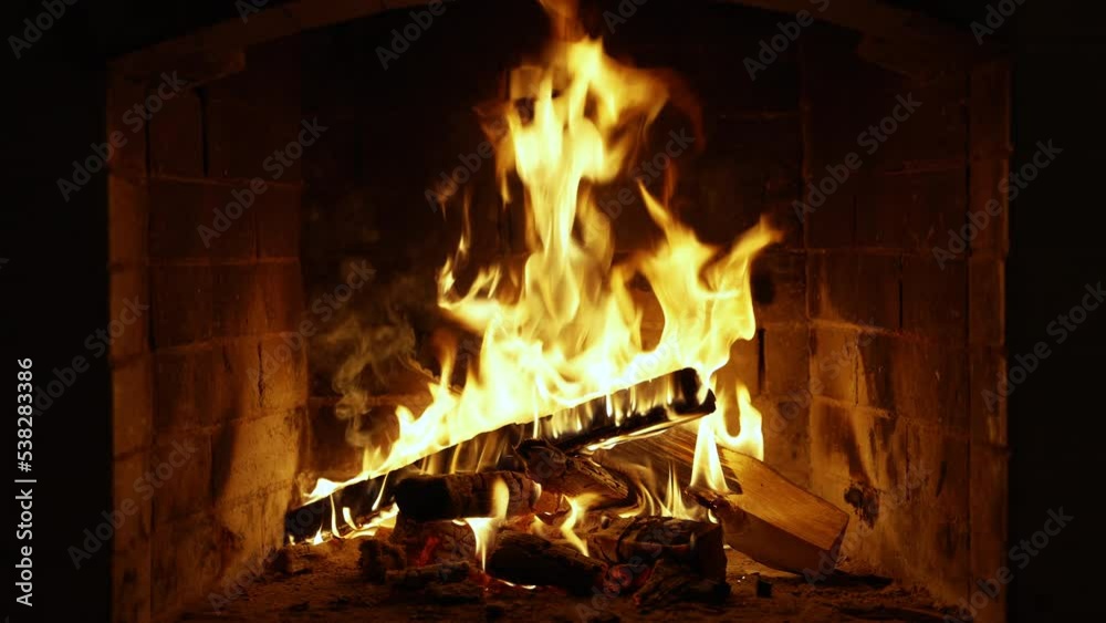 Cozy relaxing fireplace. UHD TV screen saver. Video for meditation. A Looping Clip of a Fireplace with Medium Size Flames Christmas Holidays Concept.