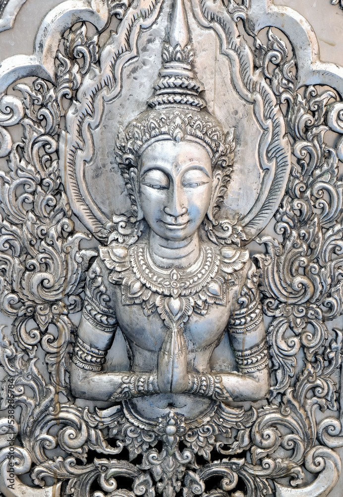 Thai style silver carving art on temple wall , Wat Srisuphan ,Chiang Mai, Thailand