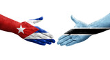 Handshake between Botswana and Cuba flags painted on hands, isolated transparent image.