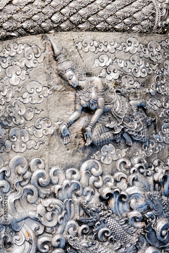 Thai style silver carving art on temple wall , Wat Srisuphan ,Chiang Mai, Thailand