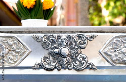 Thai style silver carving art on temple wall , Wat Srisuphan ,Chiang Mai, Thailand
