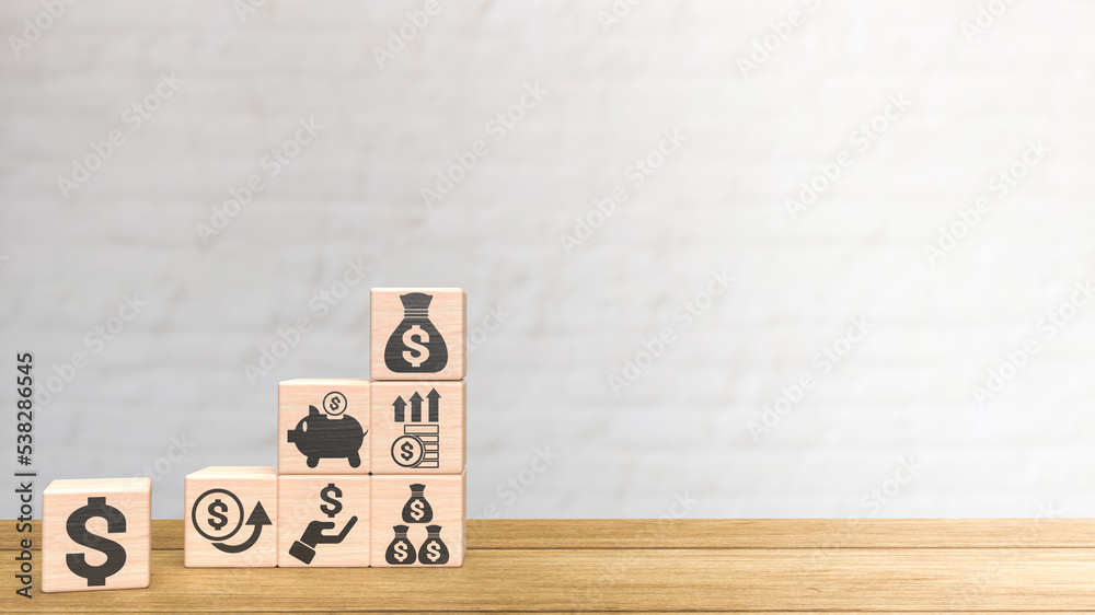 The business symbol on wood cube 3d rendering The business symbol on wood cube 3d rendering