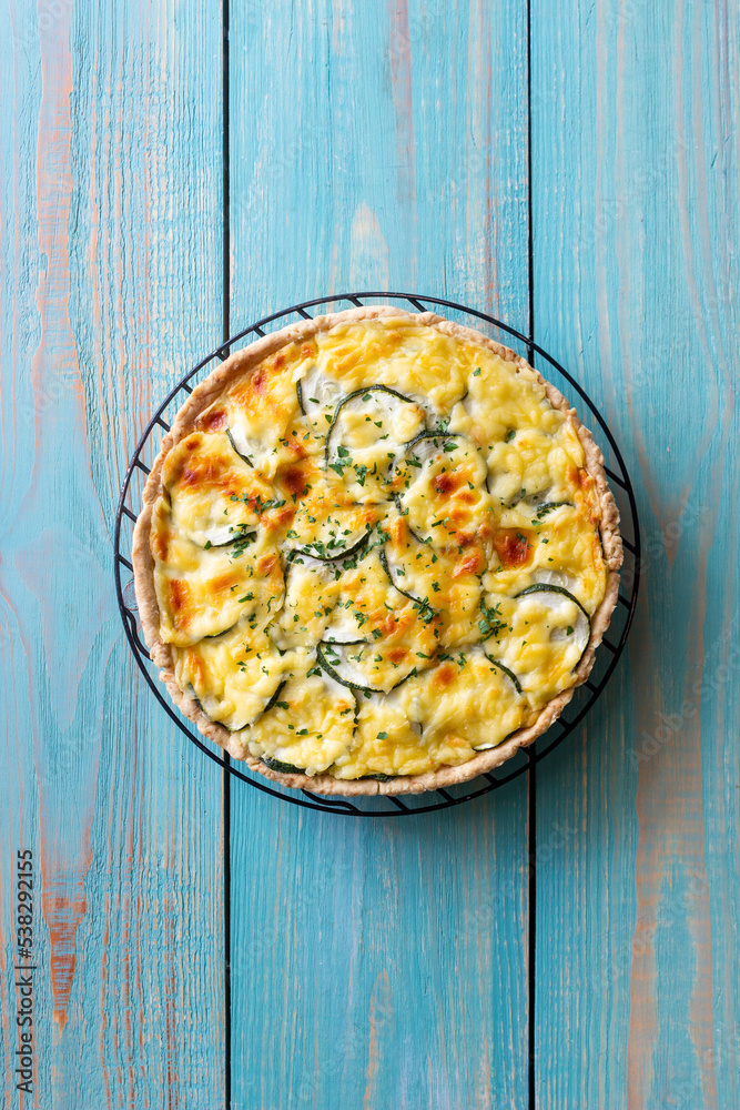 Pie with zucchini, cheese and herbs. Quiche. Vegetarian food. Healthy eating. Pie with zucchini, cheese and herbs. Quiche. Vegetarian food. Healthy eating.