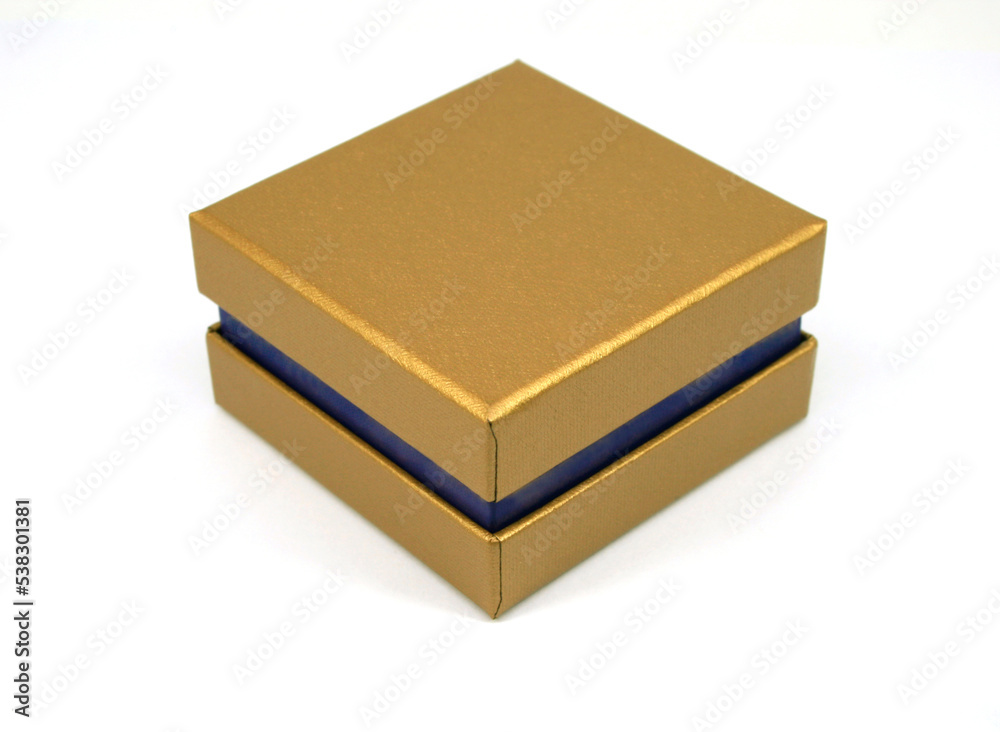 Golden gift box isolated on white Golden gift box isolated on white