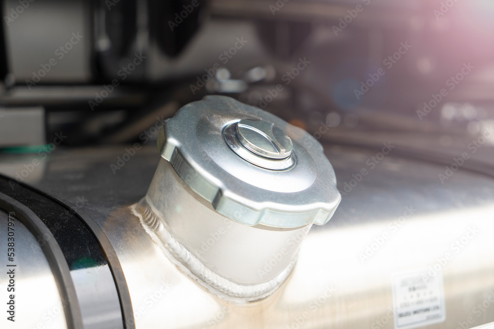 The fuel tank of the truck is closed with a cap The fuel tank of the truck is closed with a cap