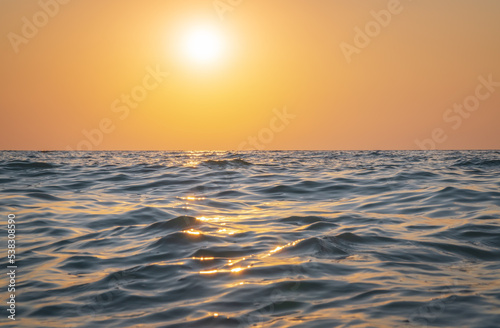 Sea waves and sunset