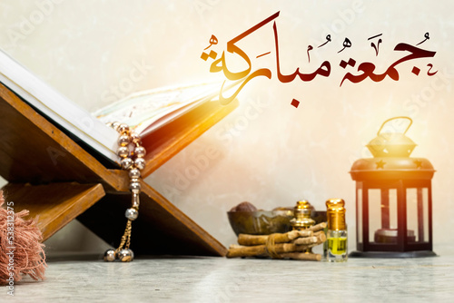 Photography Jumma Mubarak with arabic calligraphy (translation: blessed friday)