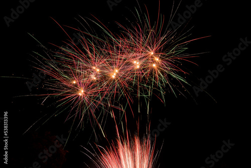 Colorful firework in celebration night with night sky background.