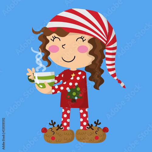 Child with christmas pajamas, reindeer antlers and a hot chocolate cup