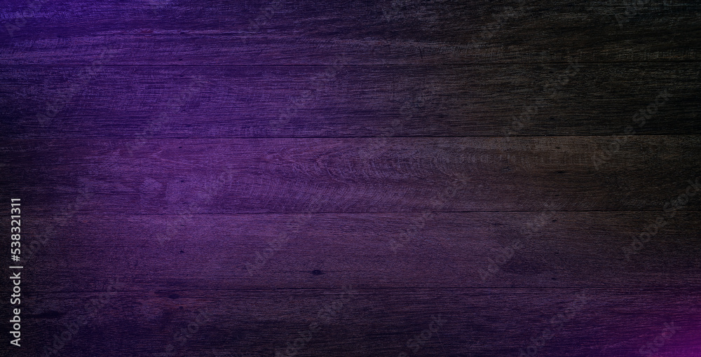 Background or texture of a wooden board in neon light Background or texture of a wooden board in neon light