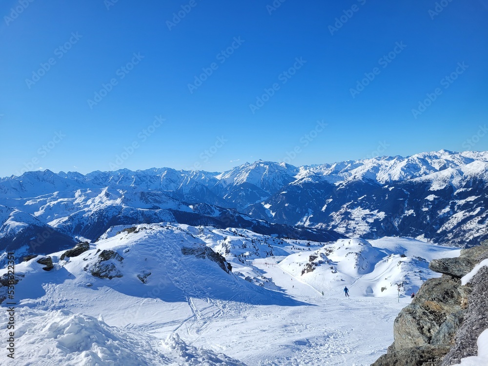 Alps mountains. View from ubergangsjoch Austria. Skiing area in Zillertal Arena, Beautiful winter landscape - nature and sport toning picture. Template for design of holiday greetings, copy space