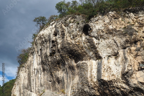 Mountain range in Mali Zvornik, Serbia, Brasina antimony deposit, Guchevo. Rocks overhanging the road photo