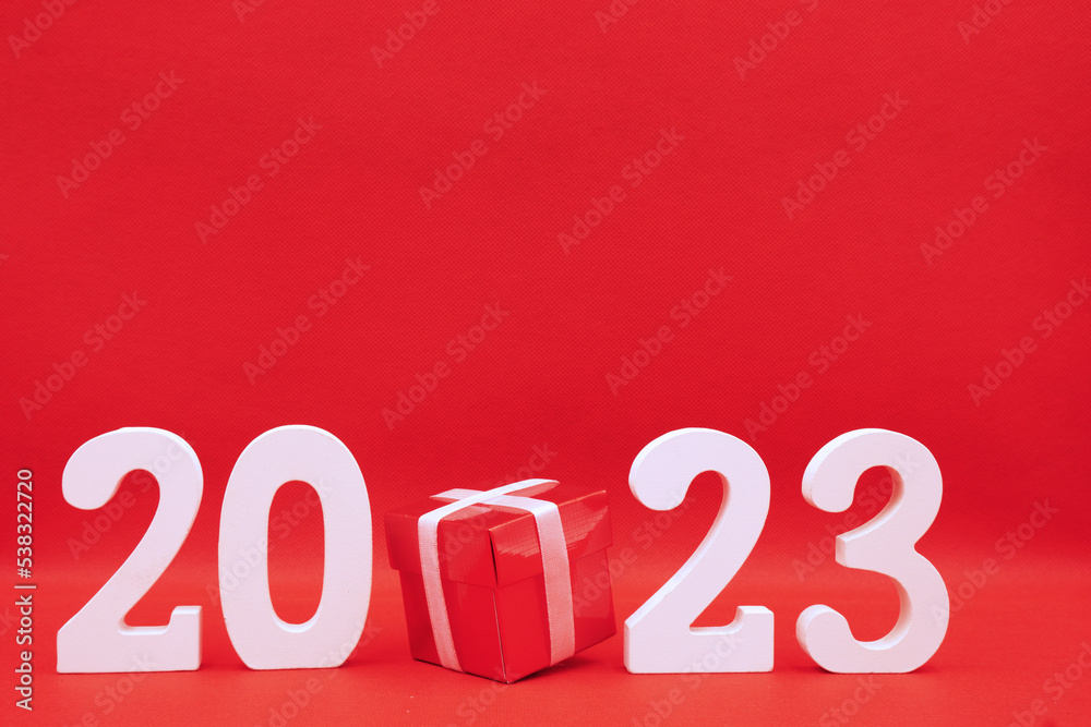 2023 number with Red Gift Box on red pattern background - End of year 2022 and Happy new year 2023 concept - Online Shopping Box , Marketing promotion advertise design , red color celebrate holiday 2023 number with Red Gift Box on red pattern background - End of year 2022 and Happy new year 2023 concept - Online Shopping Box , Marketing promotion advertise design , red color celebrate holiday