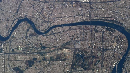 Aerial high altitude plane view of downtown Baghdad also showing the Tigris river it is the capital of Iraq and the second largest city in the Arab world after Cairo 4k resolution animation photo