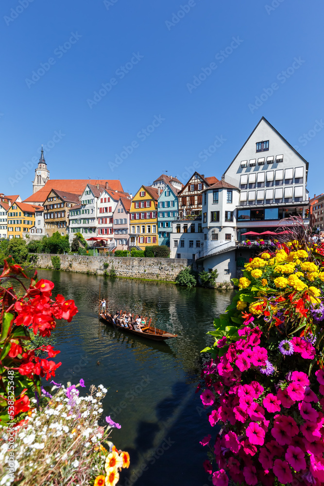 Tübingen Tuebingen town at Neckar river with punt Stocherkahn travel traveling portrait format in Germany