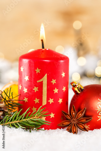 First 1st Sunday in advent with candle Christmas time decoration portrait format