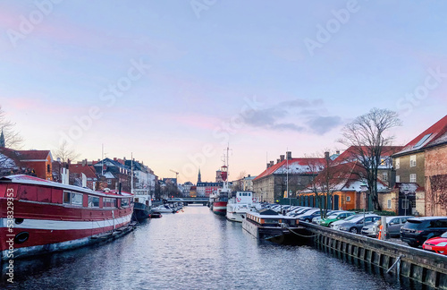 A canal in Copenhagen with a vintage view
