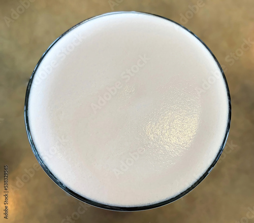 Photos Beer white foam in a pint