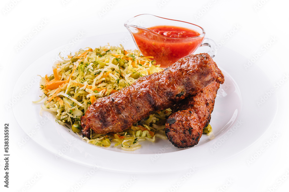 Moldavian Traditional Mititei Mici Meat Sticks with Cabbage and a Sauce