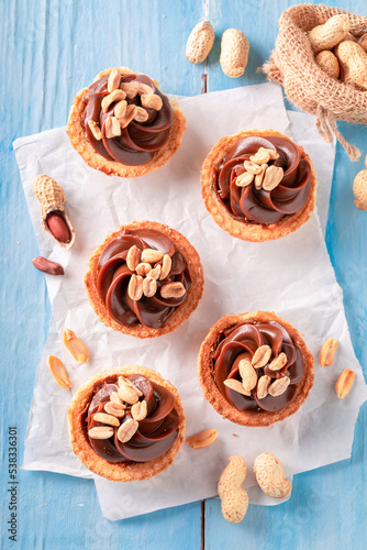 Delicious mini tartlets with butterscotch and nuts.