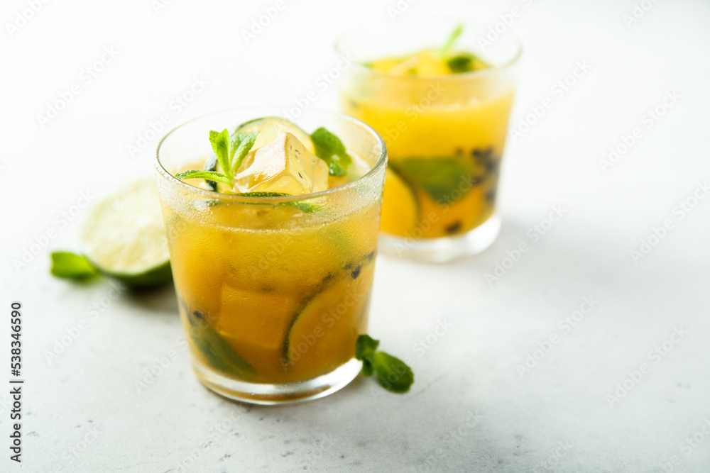 Refreshing passion fruit cocktail with lime