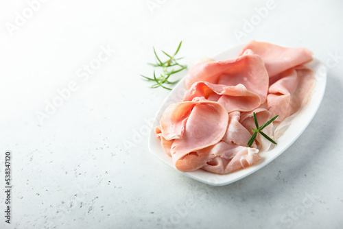 Obraz na plátně Traditional smoked ham on a white plate