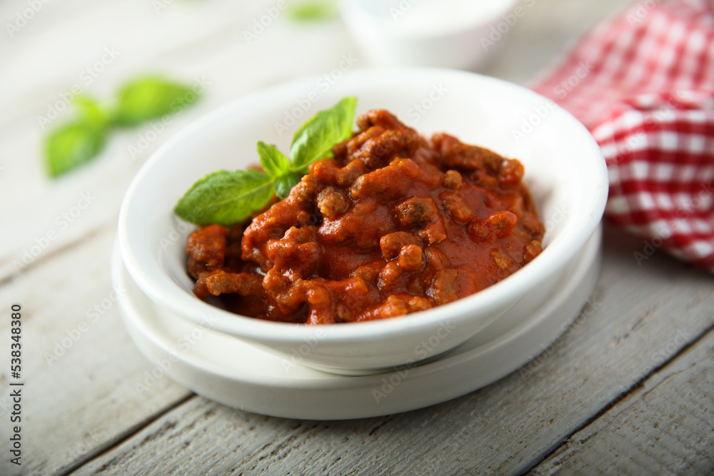 Homemade Bolognese sauce with fresh basil Homemade Bolognese sauce with fresh basil