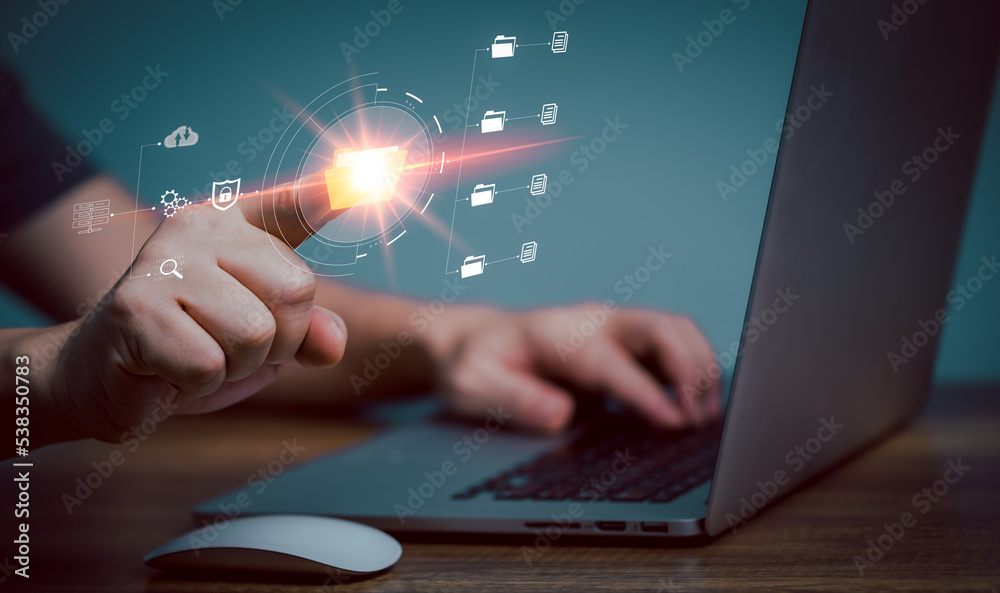 IT staff working with Document Management System (DMS), online documentation database and process automation to efficiently manage files, Corporate business technology. IT staff working with Document Management System (DMS), online documentation database and process automation to efficiently manage files, Corporate business technology.