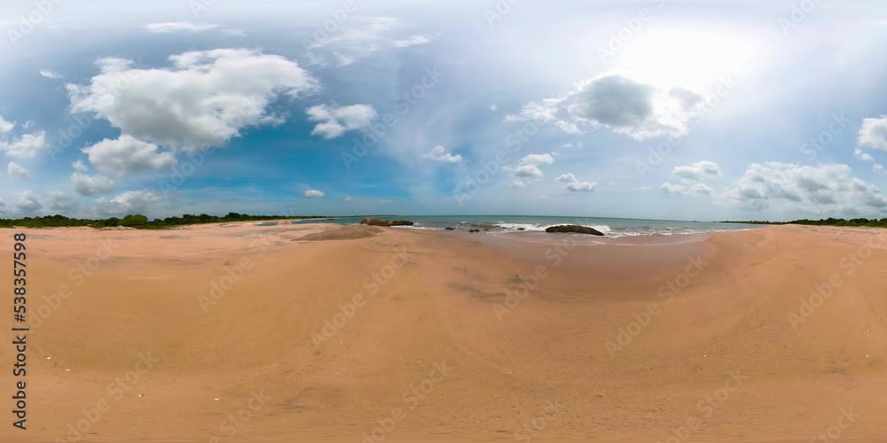 Travel concept: sandy beach and blue ocean with waves. Okanda Beach, Sri Lanka. 360 panorama VR. Travel concept: sandy beach and blue ocean with waves. Okanda Beach, Sri Lanka. 360 panorama VR.