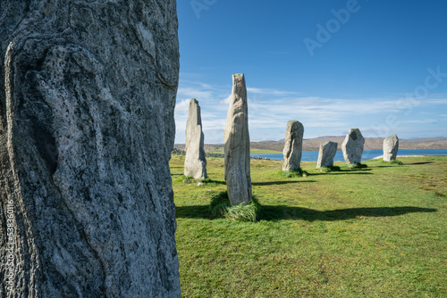 Callanish standing stones, neolithic monument, Isle of Lewis, Scotlad, UK, showing stone number 51 in the foreground and (left to right) 49, 50, 20, 21 and 22 photo