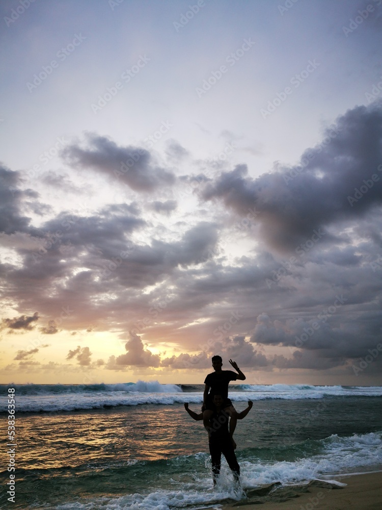 silhouette of a person on the beach