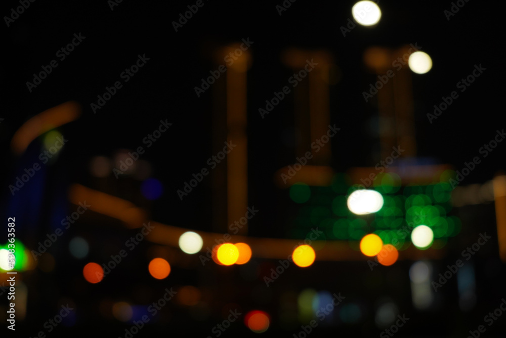 Defocused urban abstract texture background, blurred lights, City night light, light bokeh Defocused urban abstract texture background, blurred lights, City night light, light bokeh