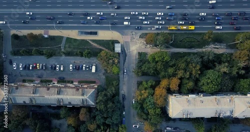 Track from the air a lot of cars moving on the road photo