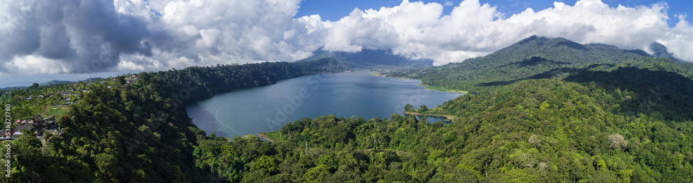 Danau Buyan Lake at High Forestry Hill Under Grey Clouds aerial panorama view