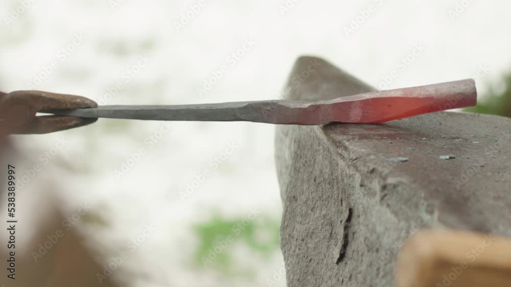 Blacksmith forging Red hot steel Blacksmith forging Red hot steel