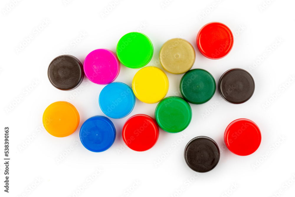 Сolorful plastic caps on white background, recycle for environment concept. Separate waste sorting. Space for text. Сolorful plastic caps on white background, recycle for environment concept. Separate waste sorting. Space for text.