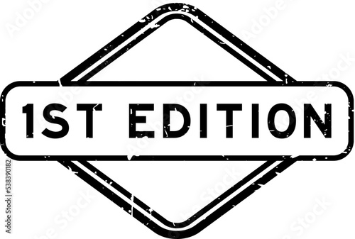 Grunge black 1st (First) edition word rubber seal stamp on white background