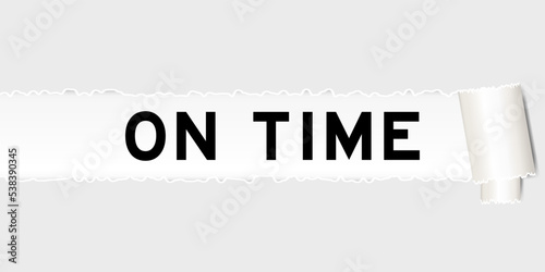 Ripped gray paper background that have word on time under torn part