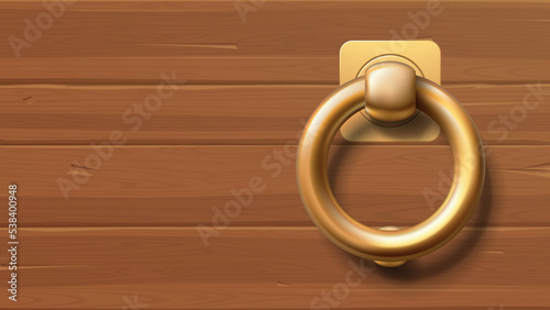 gold color door knob on wooden texture