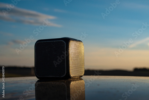 Bluetooth speaker on cars roof 