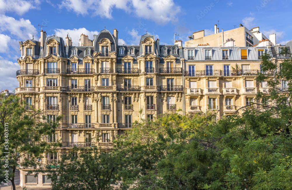 Parisian architecture. Typical historical apartment building. Paris, France.