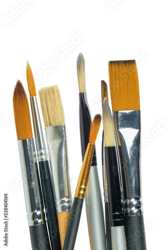 Various professional paint brushes isolated on white background