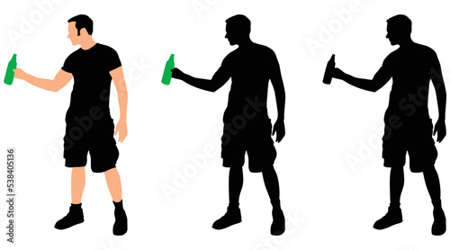 Casual young man drinking bottle of beer