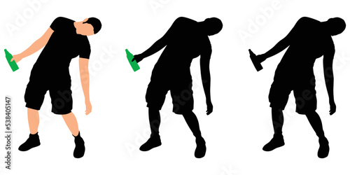 Casual young man drinking bottle of beer